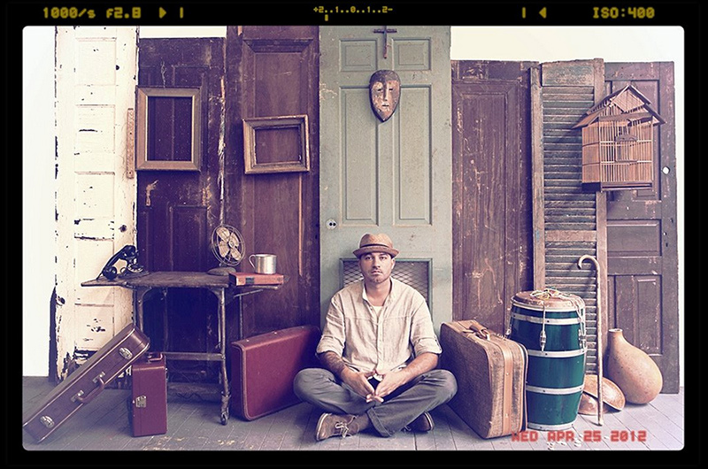 Artist Adrian "Viajero" Roman in his studio